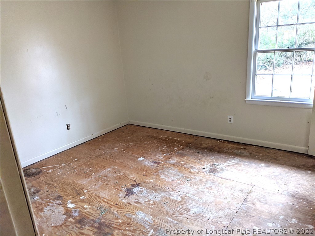 661 Azalea Drive Spring Lake, NC 28390 - Photo 6 of 7 an empty room with a window