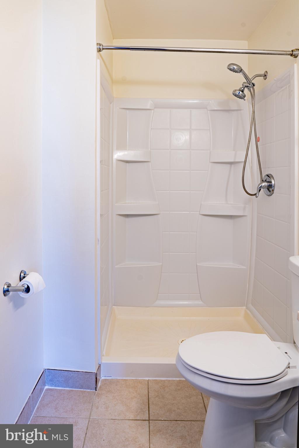 2913 Seminole Road Woodbridge, VA 22192 - Photo 28 of 34 a bathroom with a toilet and shower