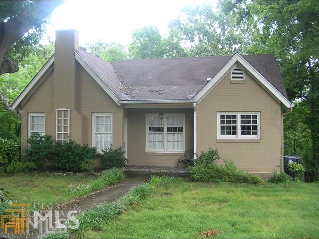 116 Woodcrest Drive Southwest Rome, GA 30161 - Photo 1 of 1 a view of a house with yard and plants