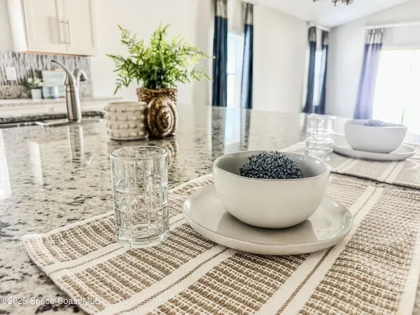 a view of a two chair in the patio