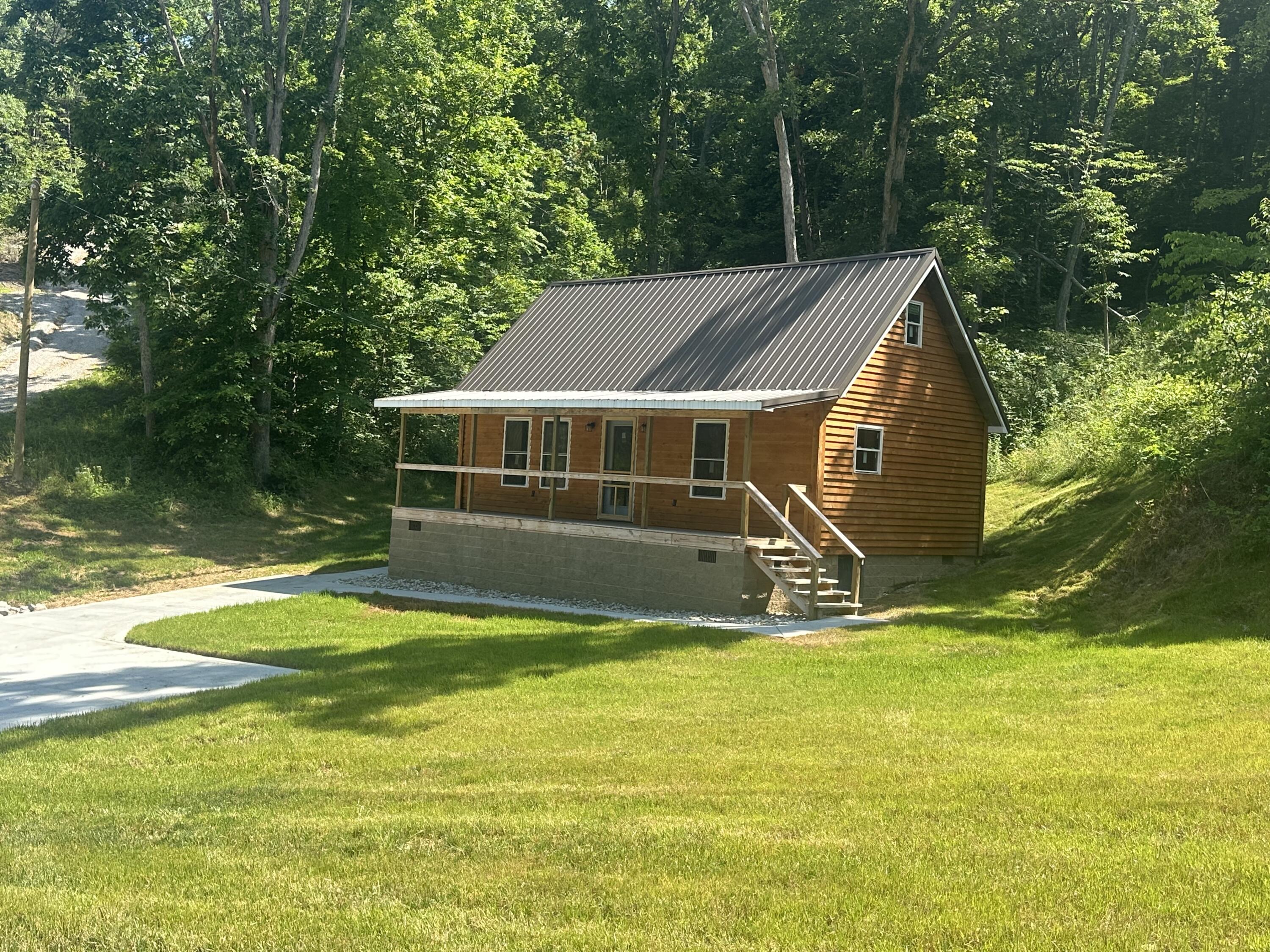 409 Freeman Branch Road East Bernstadt, KY 40729 - Photo 43 of 43 RUSTIC CABIN