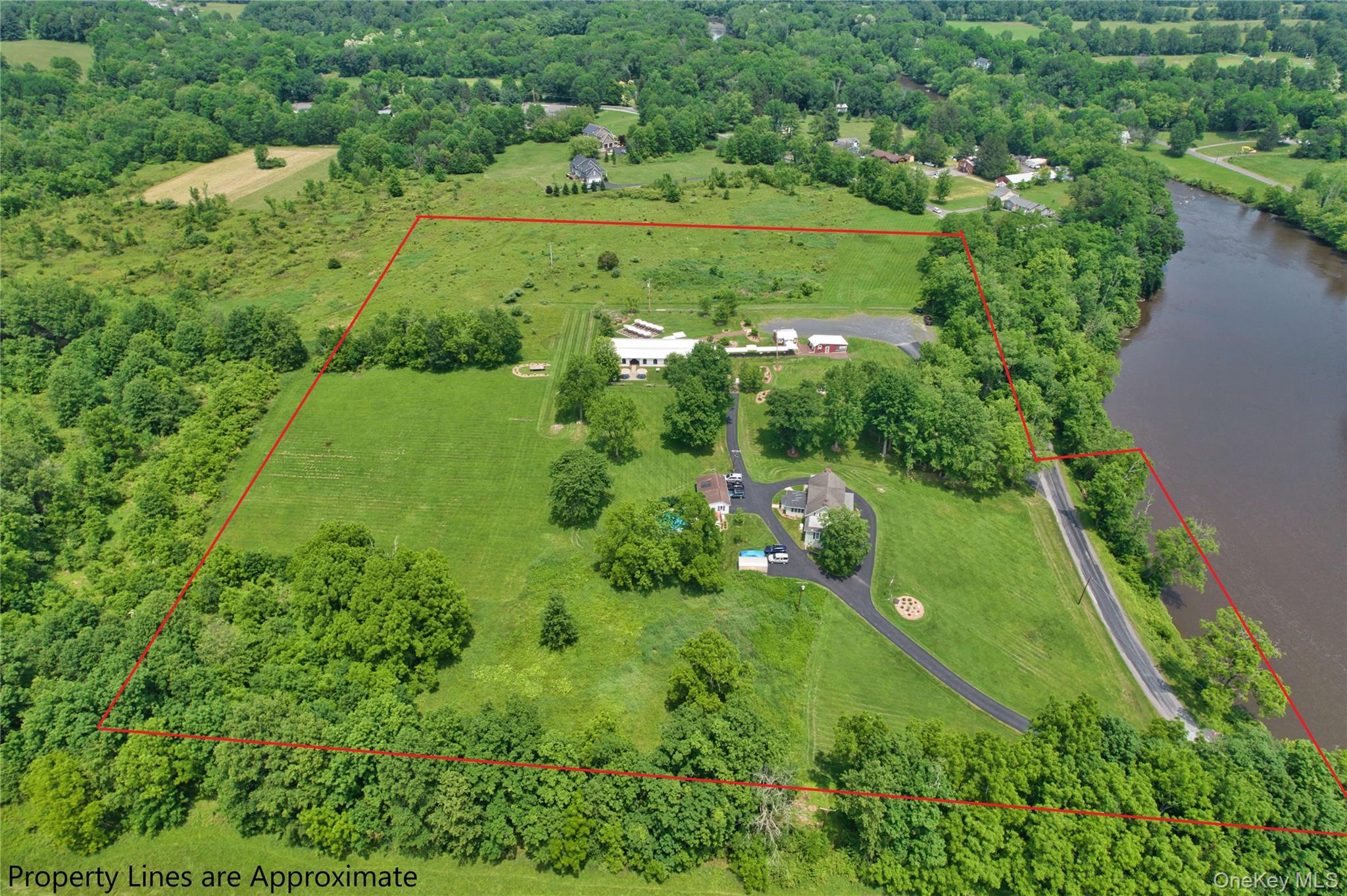 69 Lippincott Road Wallkill, NY 12589 - Photo 34 of 34 Overview of rural landscape with property boundaries highlighted and a large body of water