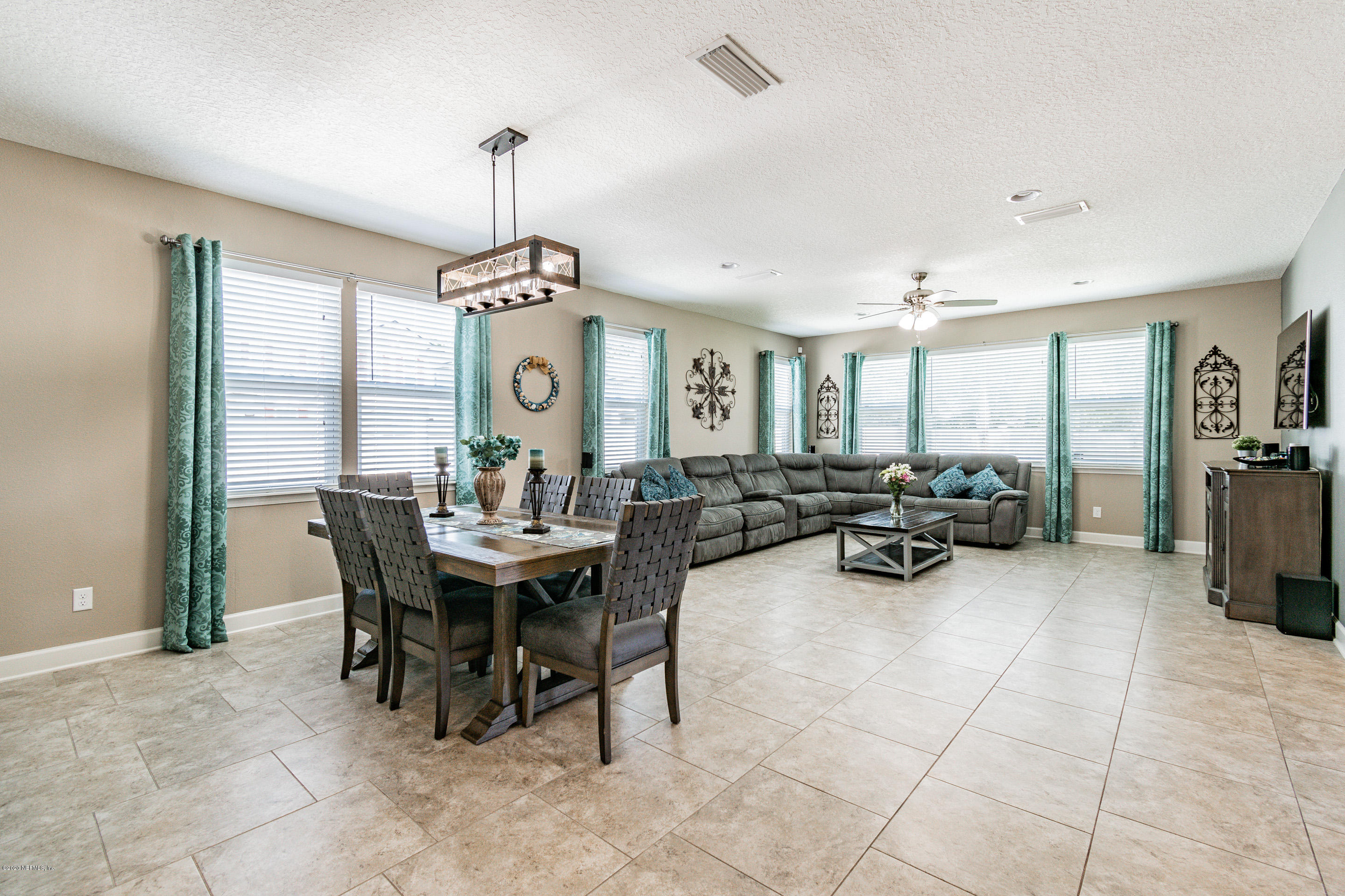 6737 Discovery Crossing Road Jacksonville, FL 32259 - Photo 17 of 51 a view of a dining room with furniture window and outside view