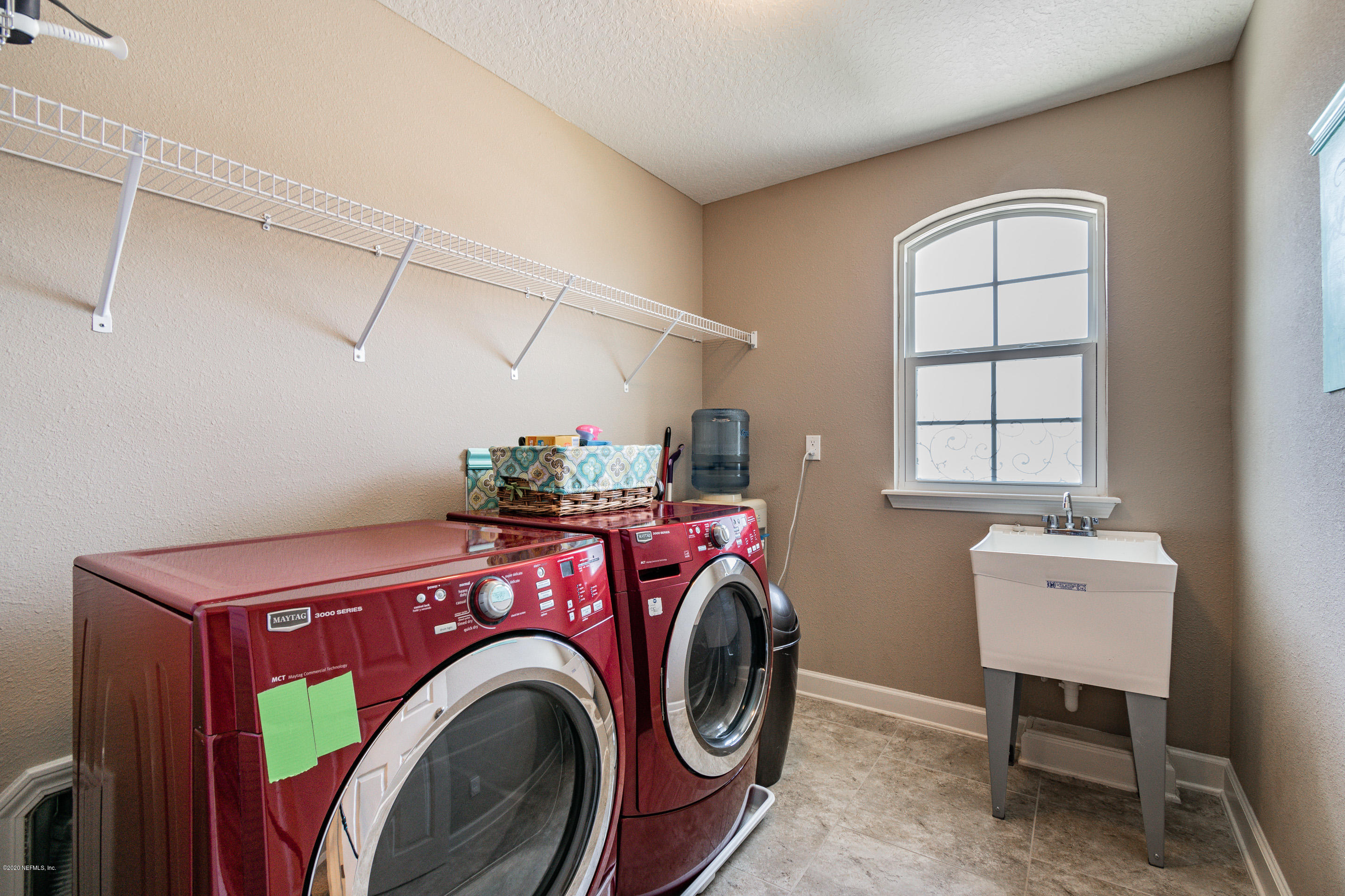 6737 Discovery Crossing Road Jacksonville, FL 32259 - Photo 29 of 51 a utility room with dryer and washer