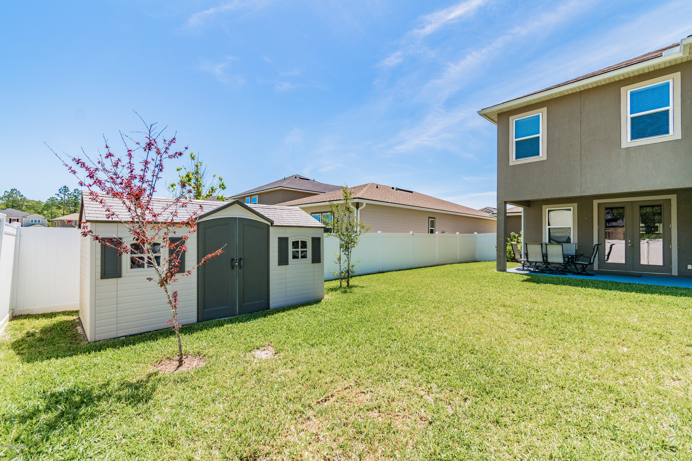 6737 Discovery Crossing Road Jacksonville, FL 32259 - Photo 45 of 51 a house with garden in front of it