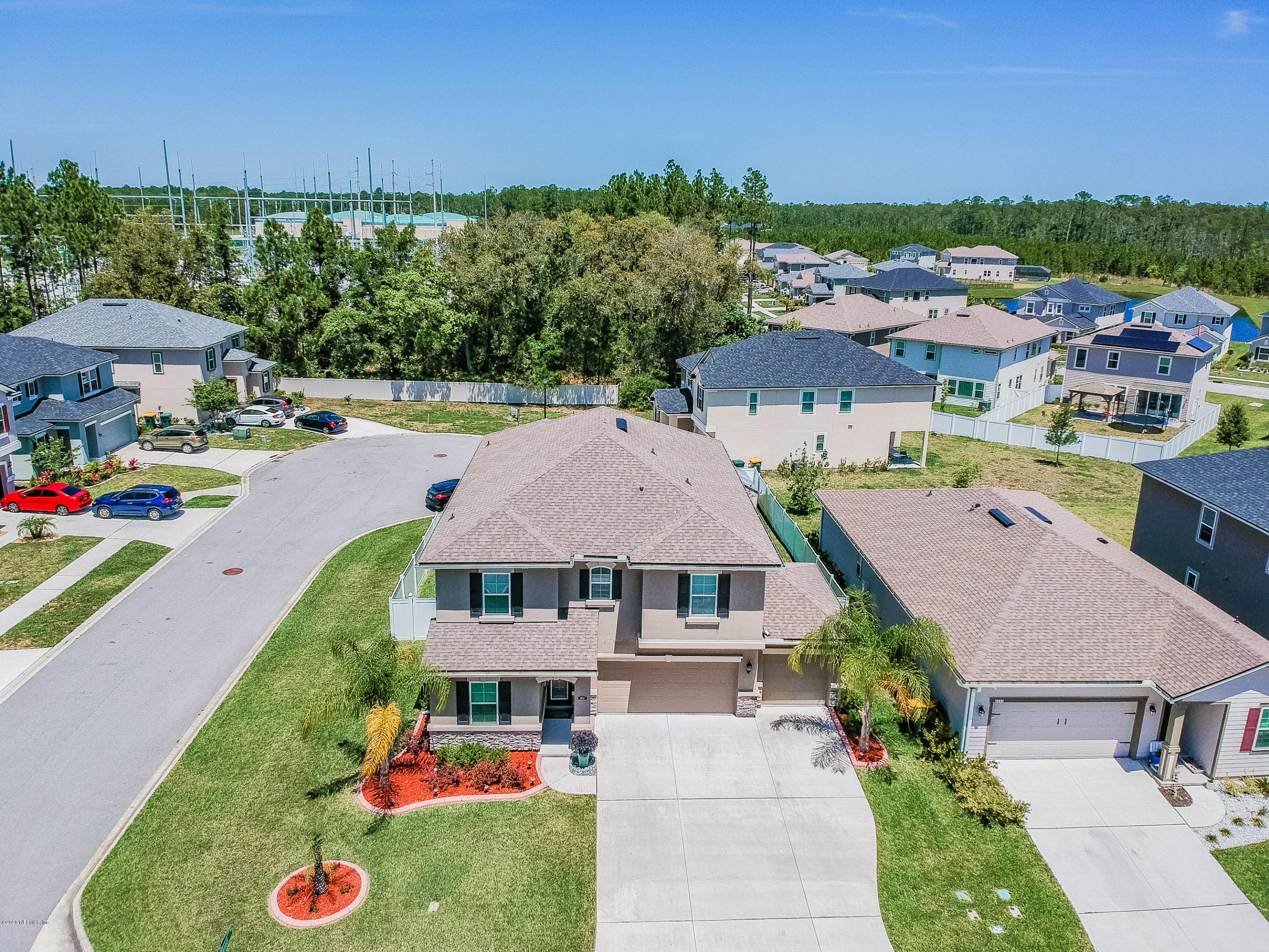 6737 Discovery Crossing Road Jacksonville, FL 32259 - Photo 49 of 51 an aerial view of a house with garden space and street view