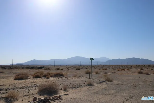 a view of a lake with mountain in the background