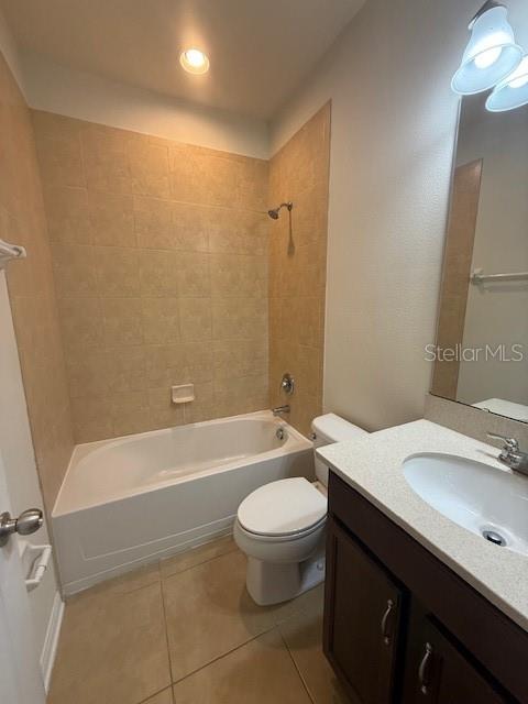 8145 Serenity Spring Drive, Unit GE Windermere, FL 34786 - Photo 21 of 31 a bathroom with a sink a toilet and a bathtub
