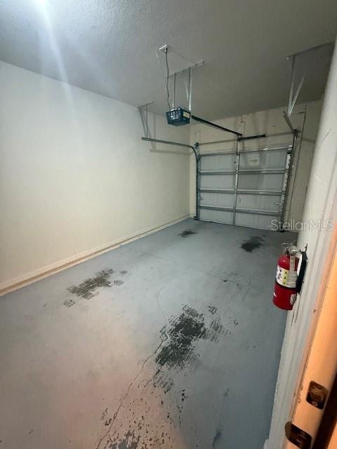 8145 Serenity Spring Drive, Unit GE Windermere, FL 34786 - Photo 28 of 31 a view of storage and utility room with racks on the wall