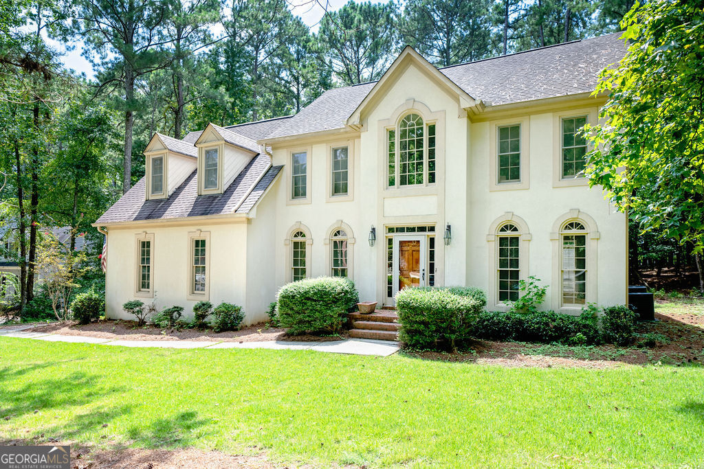 115 Monte Ridge Way Fayetteville, GA 30215 - Photo 2 of 32 a view of outdoor space yard and front view of a house