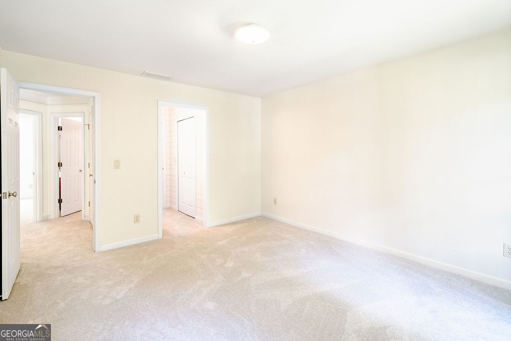 115 Monte Ridge Way Fayetteville, GA 30215 - Photo 21 of 32 a view of an empty room