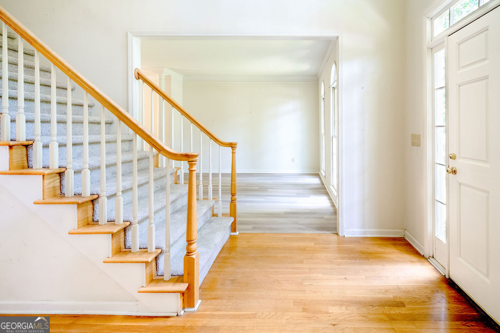 115 Monte Ridge Way Fayetteville, GA 30215 - Photo 6 of 32 a view of entryway and hall with wooden floor