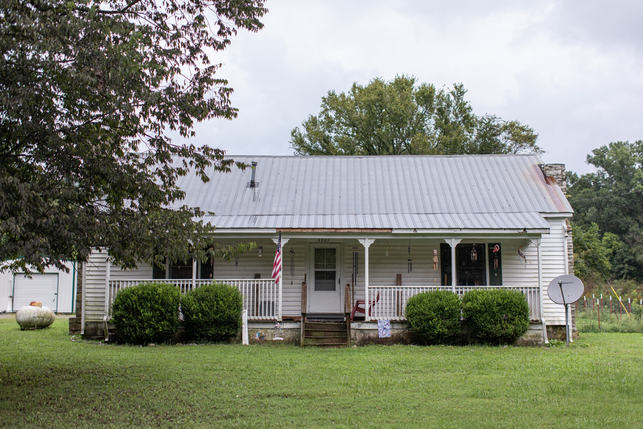 5507 Snow Creek Road Santa Fe, TN 38482 - Photo 11 of 19 a front view of a house with a yard