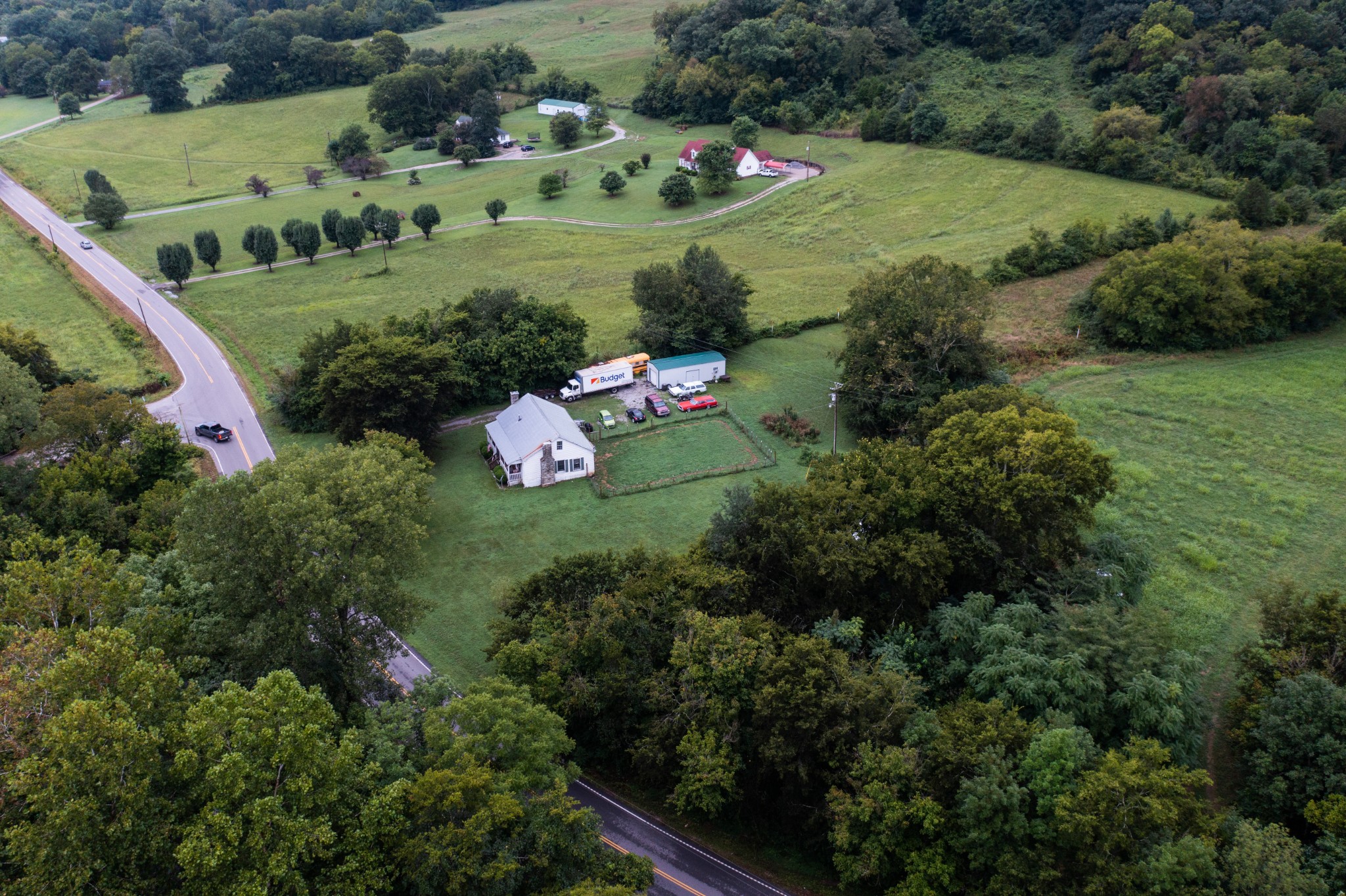 5507 Snow Creek Road Santa Fe, TN 38482 - Photo 9 of 19 a view of a garden with a street and and trees