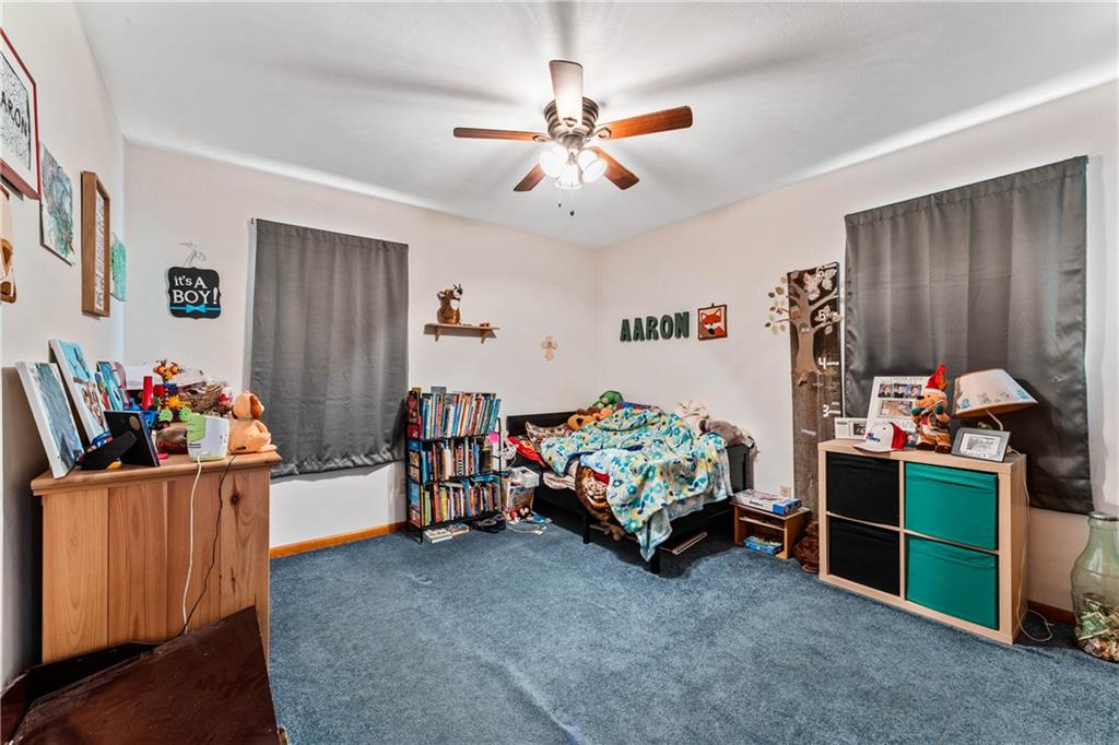 4930 Georgetown Road Franklin, PA 16323 - Photo 15 of 25 a bedroom with furniture and a fan