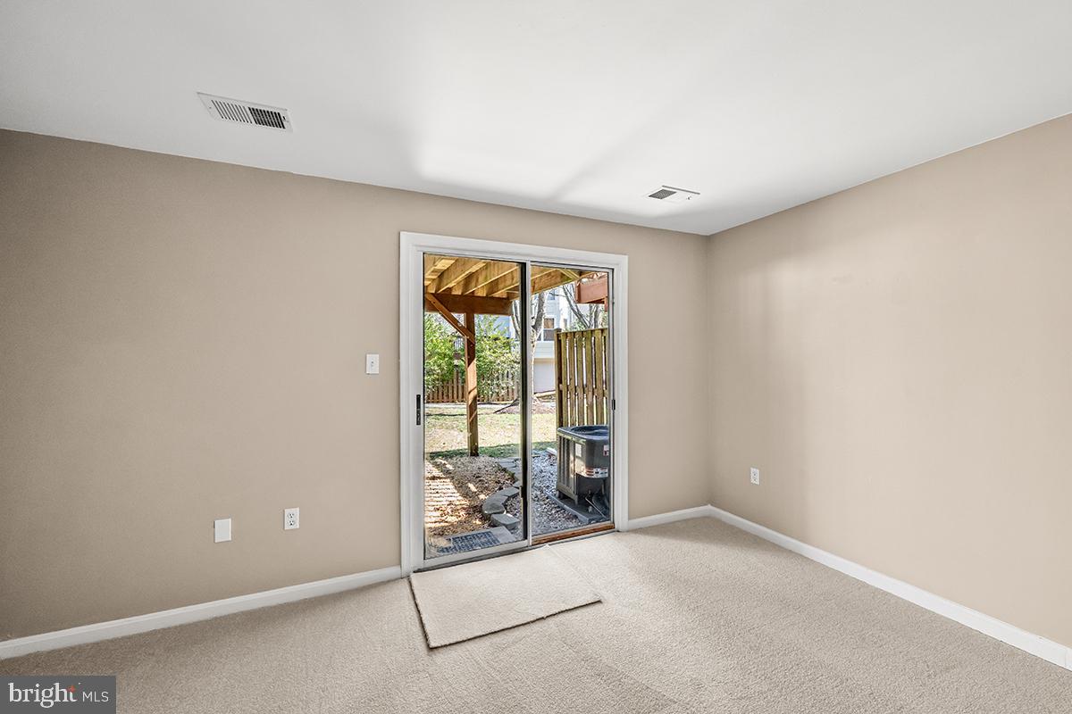 144 Forests Edge Place Laurel, MD 20724 - Photo 21 of 31 an empty room with windows