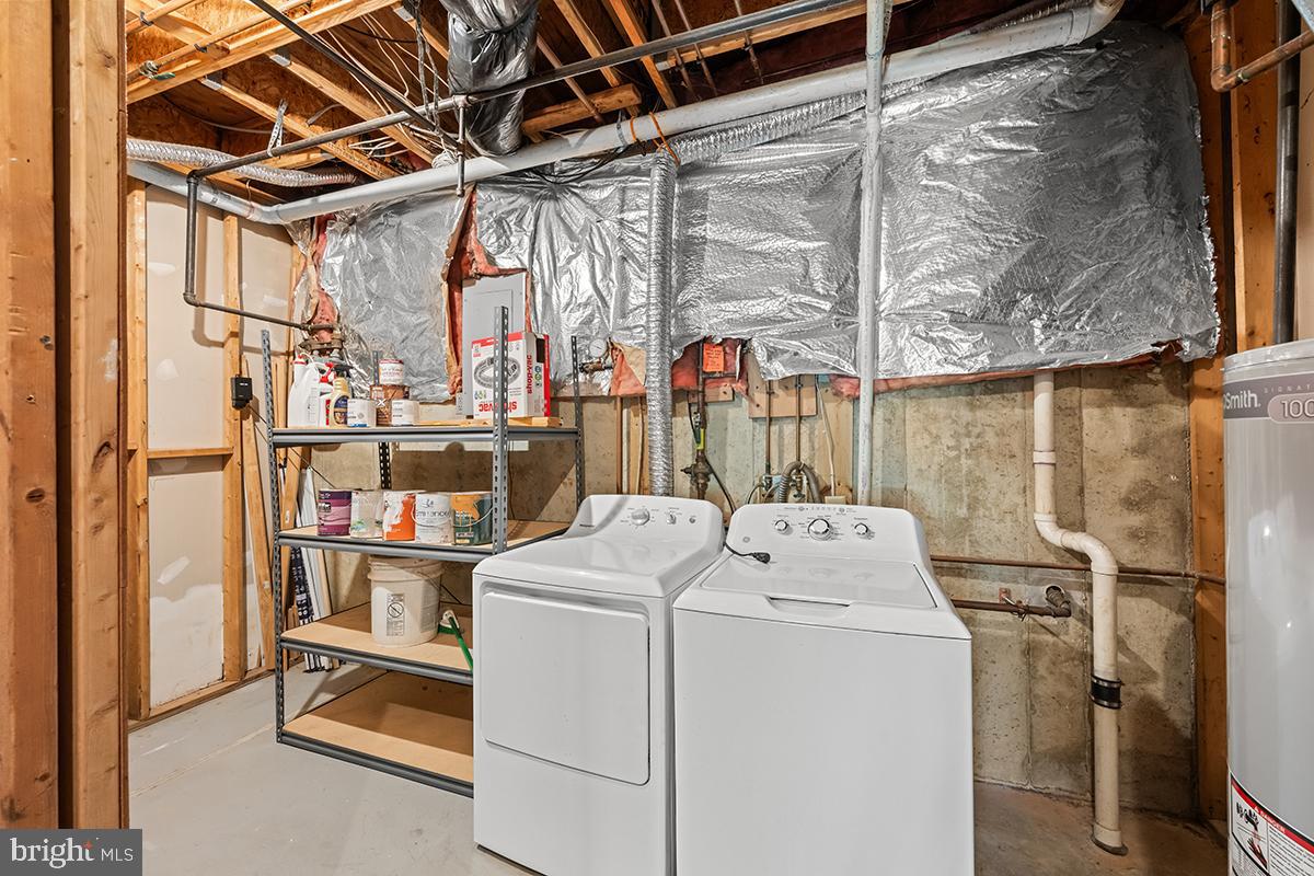 144 Forests Edge Place Laurel, MD 20724 - Photo 25 of 31 a utility room with dryer and washer