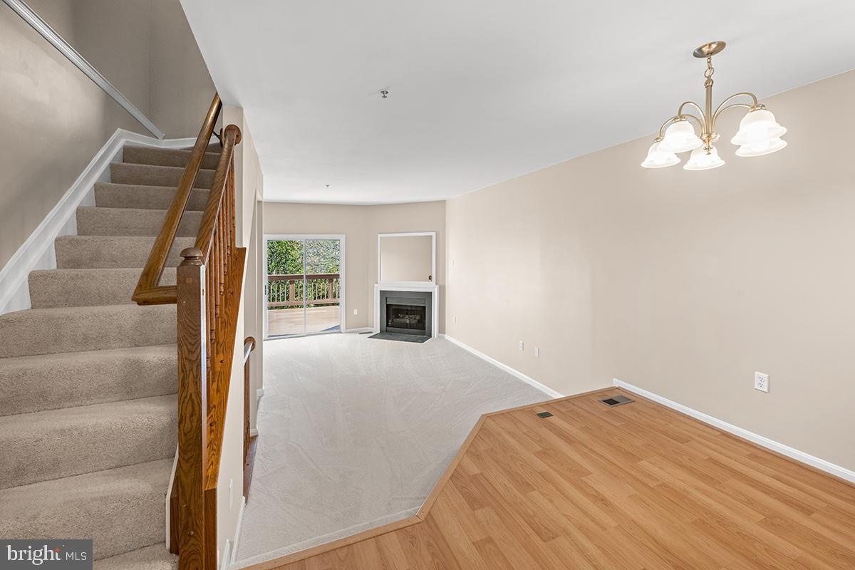 144 Forests Edge Place Laurel, MD 20724 - Photo 6 of 31 a view of empty room with wooden floor and fan