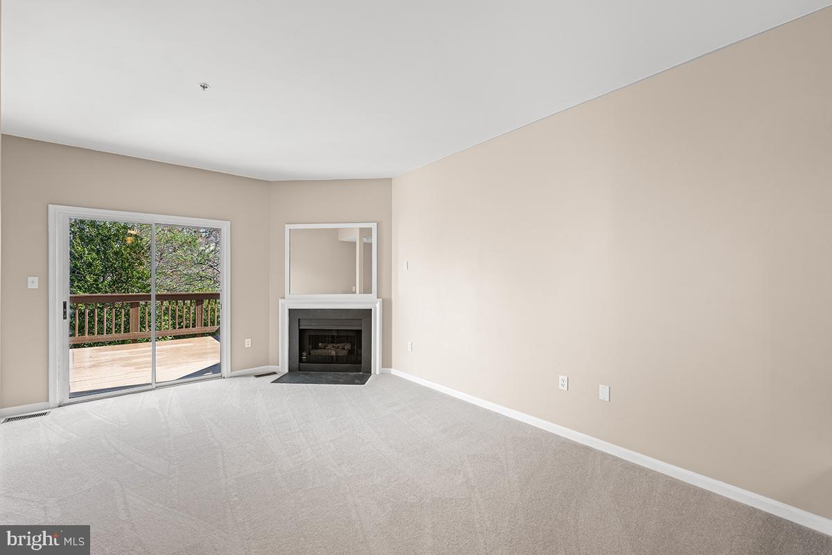 144 Forests Edge Place Laurel, MD 20724 - Photo 8 of 31 a view of empty room with a fireplace
