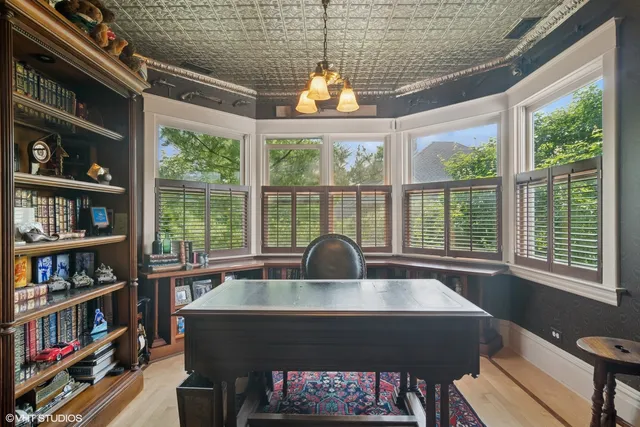 a view of a dining room with furniture window and outside view