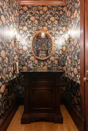a stove top oven sitting inside of a kitchen