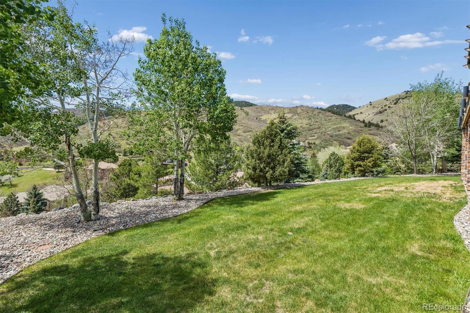 16422 Rocky Point Lane Morrison, CO 80465 - Photo 45 of 50 a view of a lush green space