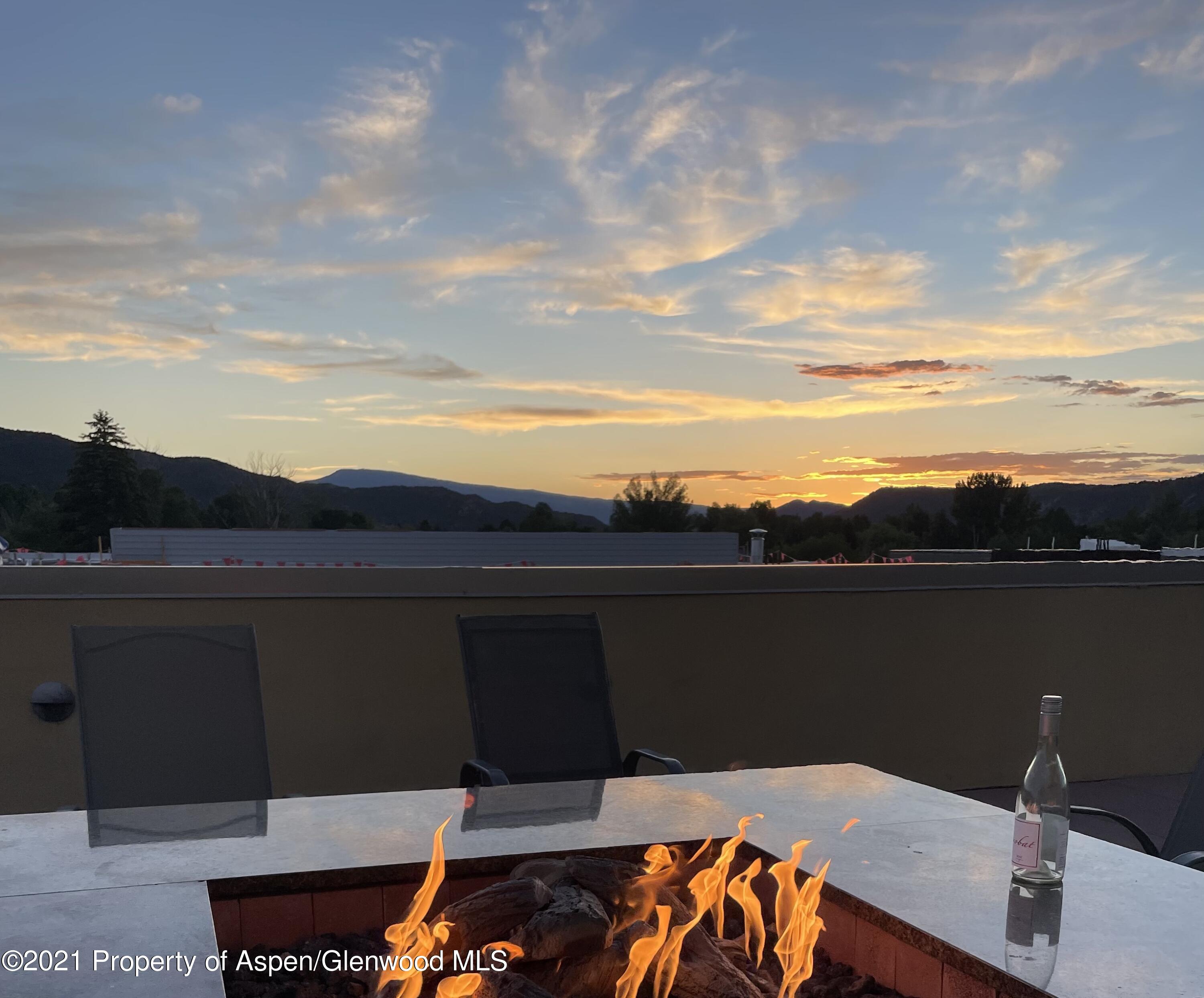 231 Robinson Street, Unit 306 Basalt, CO 81621 - Photo 14 of 15 a terrace of a house with outdoor seating