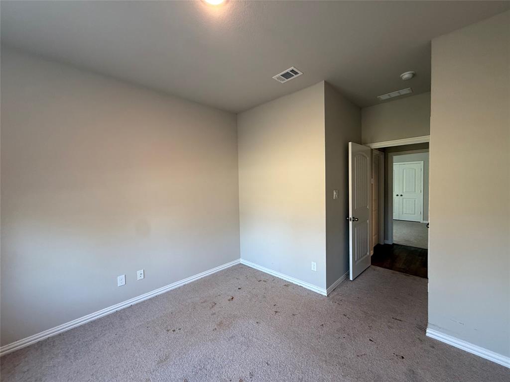 509 Smith Road Springtown, TX 76082 - Photo 24 of 28 Secondary Bedroom 3