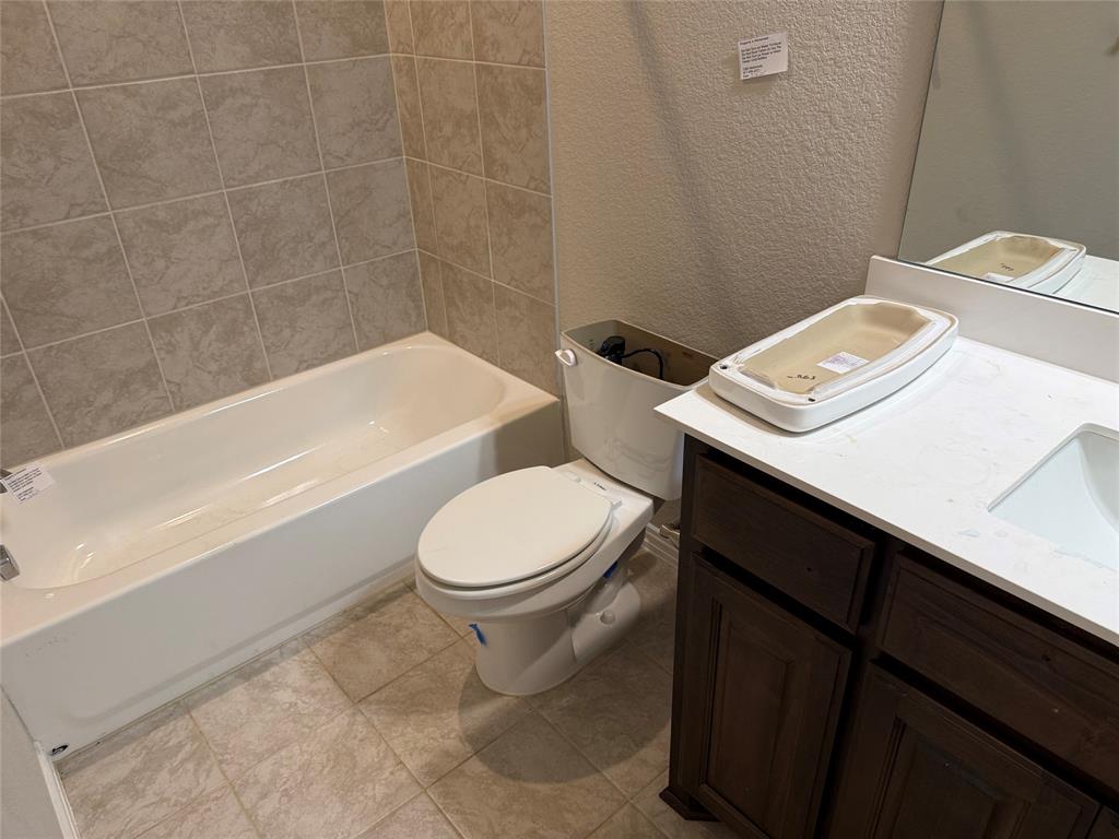 509 Smith Road Springtown, TX 76082 - Photo 26 of 28 Hall bath shared by Bedrooms 2,3 & 4