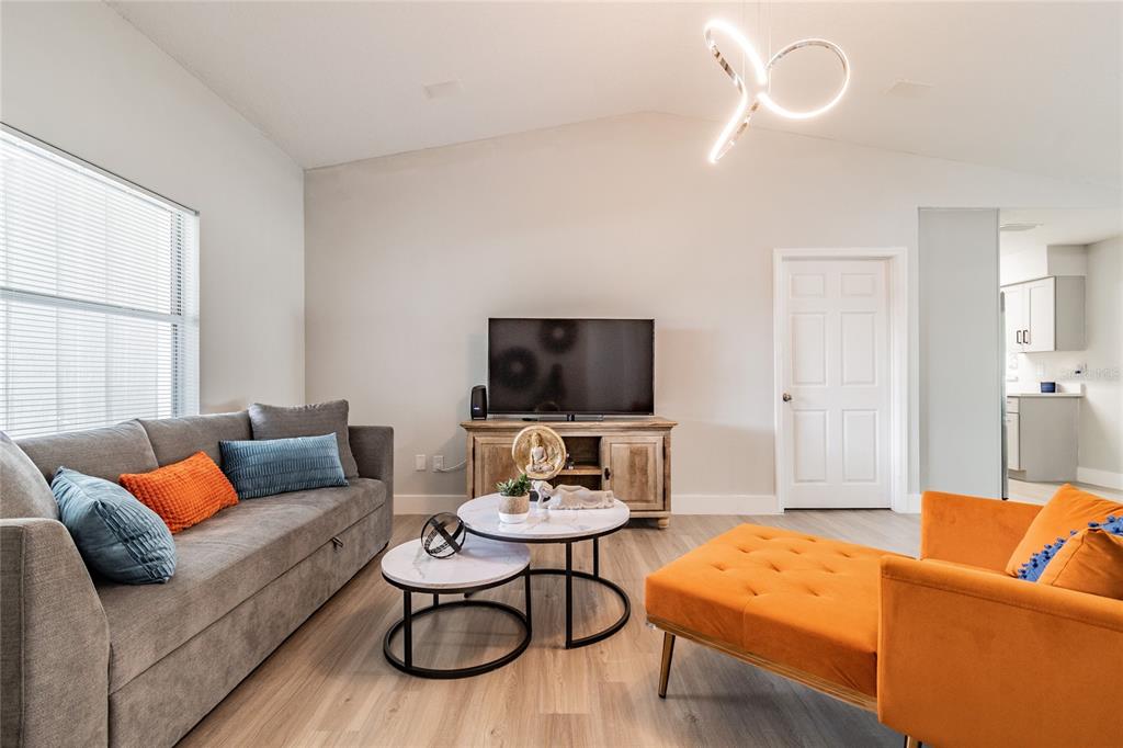 14003 Ridgedale Way Tampa, FL 33625 - Photo 11 of 28 a living room with furniture and a flat screen tv