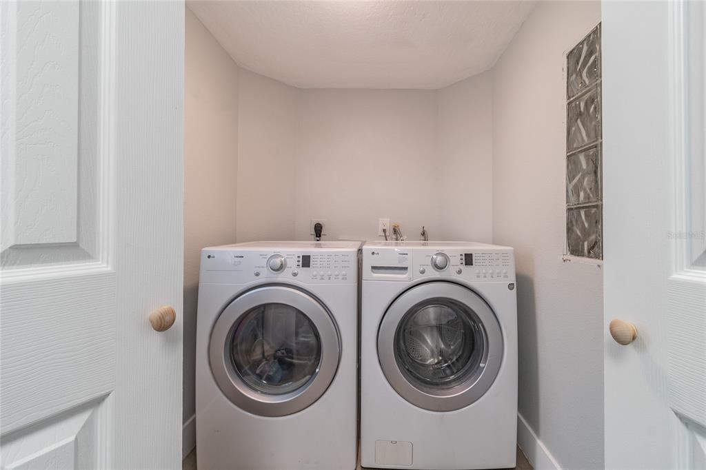 14003 Ridgedale Way Tampa, FL 33625 - Photo 17 of 28 a utility room with dryer and washer