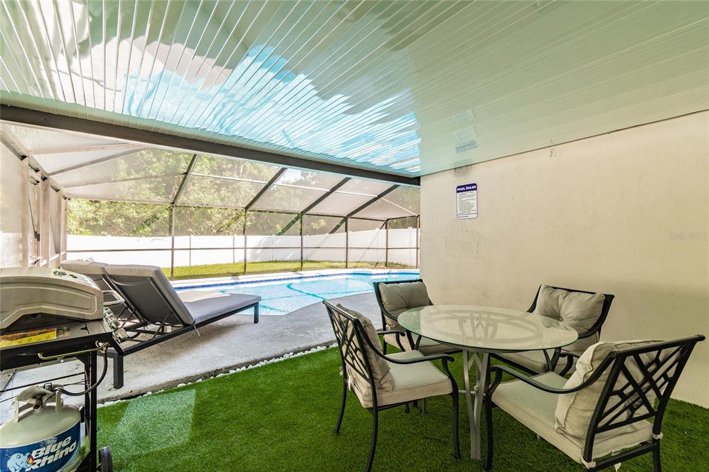 14003 Ridgedale Way Tampa, FL 33625 - Photo 23 of 28 a view of a dining room with furniture and window