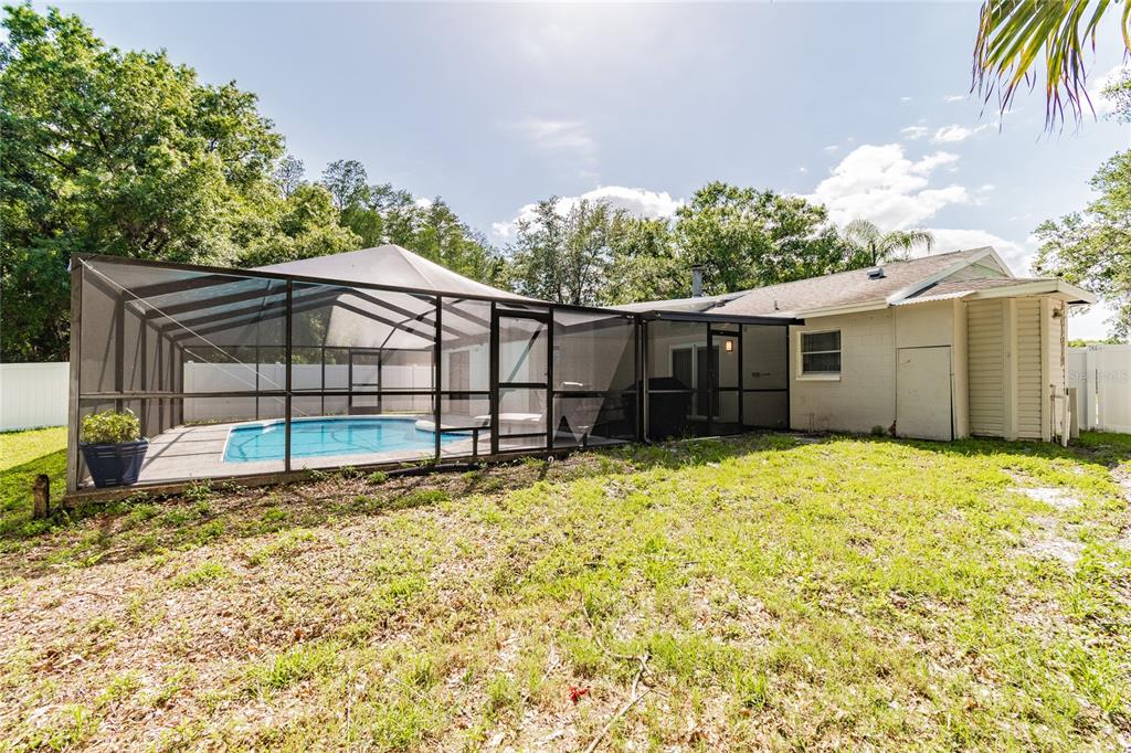 14003 Ridgedale Way Tampa, FL 33625 - Photo 25 of 28 a view of a house with a yard