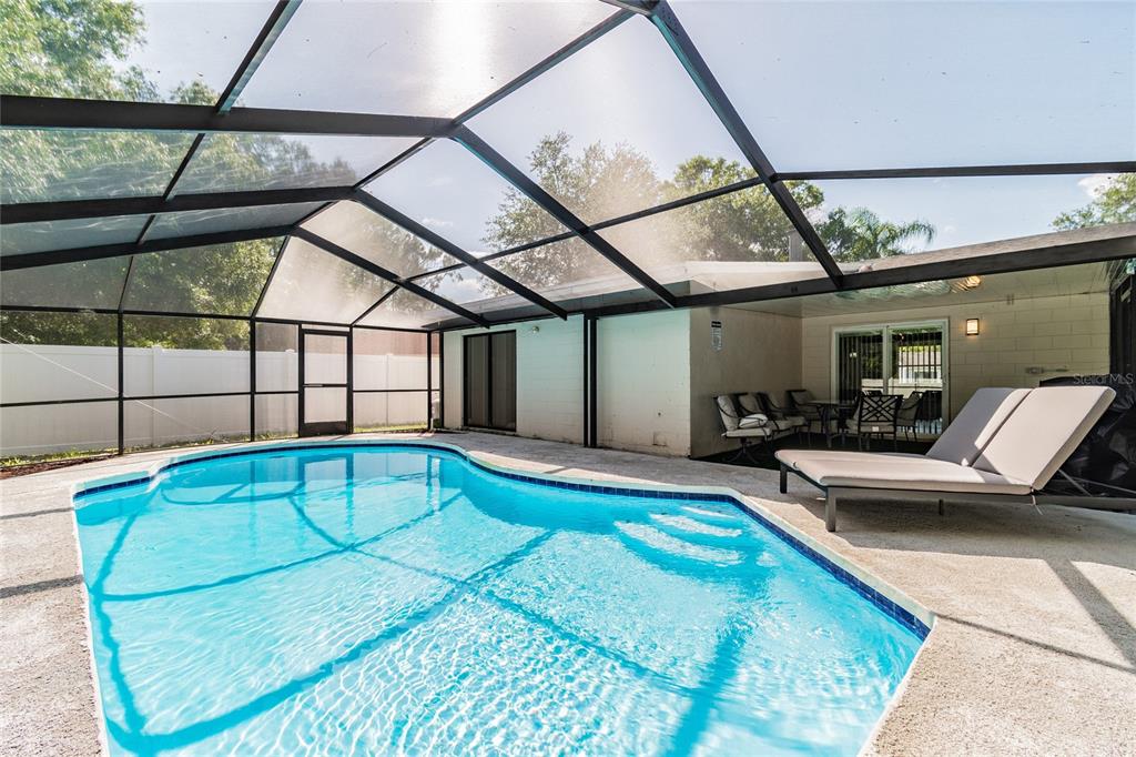 14003 Ridgedale Way Tampa, FL 33625 - Photo 28 of 28 a indoor swimming pool with a outdoor seating