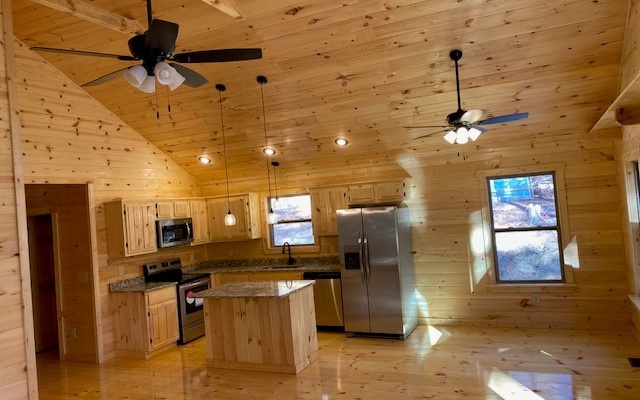 237 Bentley Cove Murphy, NC 28906 - Photo 16 of 35 a kitchen with stainless steel appliances kitchen island granite countertop a refrigerator and a stove