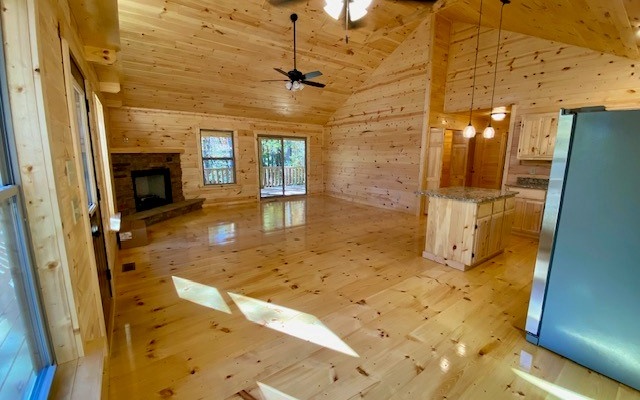 237 Bentley Cove Murphy, NC 28906 - Photo 35 of 35 a view of a hallway with wooden floor and a fireplace