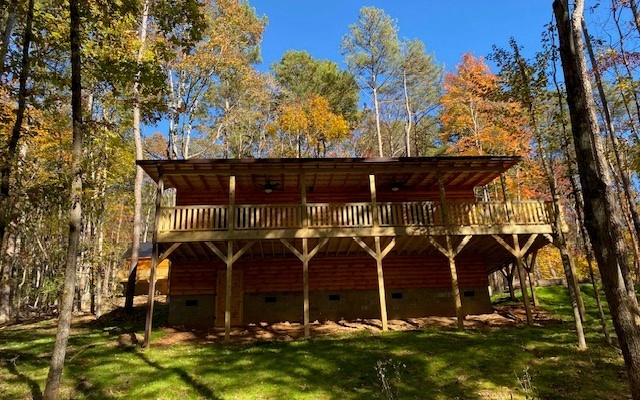 237 Bentley Cove Murphy, NC 28906 - Photo 7 of 35 an outdoor space with lots of yellow lighting