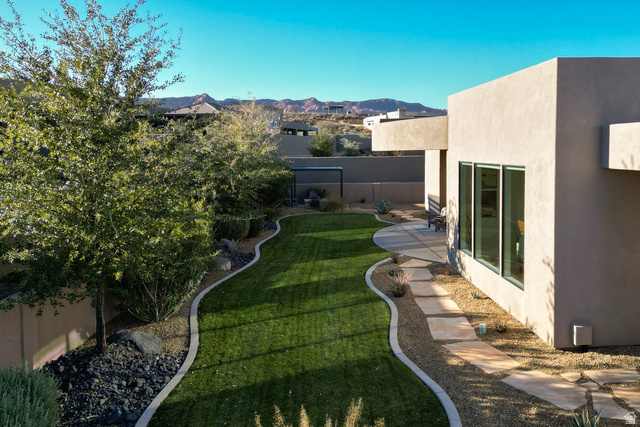 2197 Reserve Circle St. George, UT 84770 - Photo 4 of 57 Fenced backyard featuring a mountain view