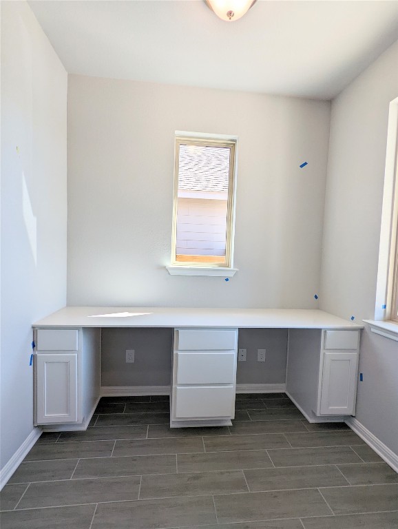 121 Drifter Lane Jarrell, TX 76537 - Photo 11 of 17 a room with a desk and a window