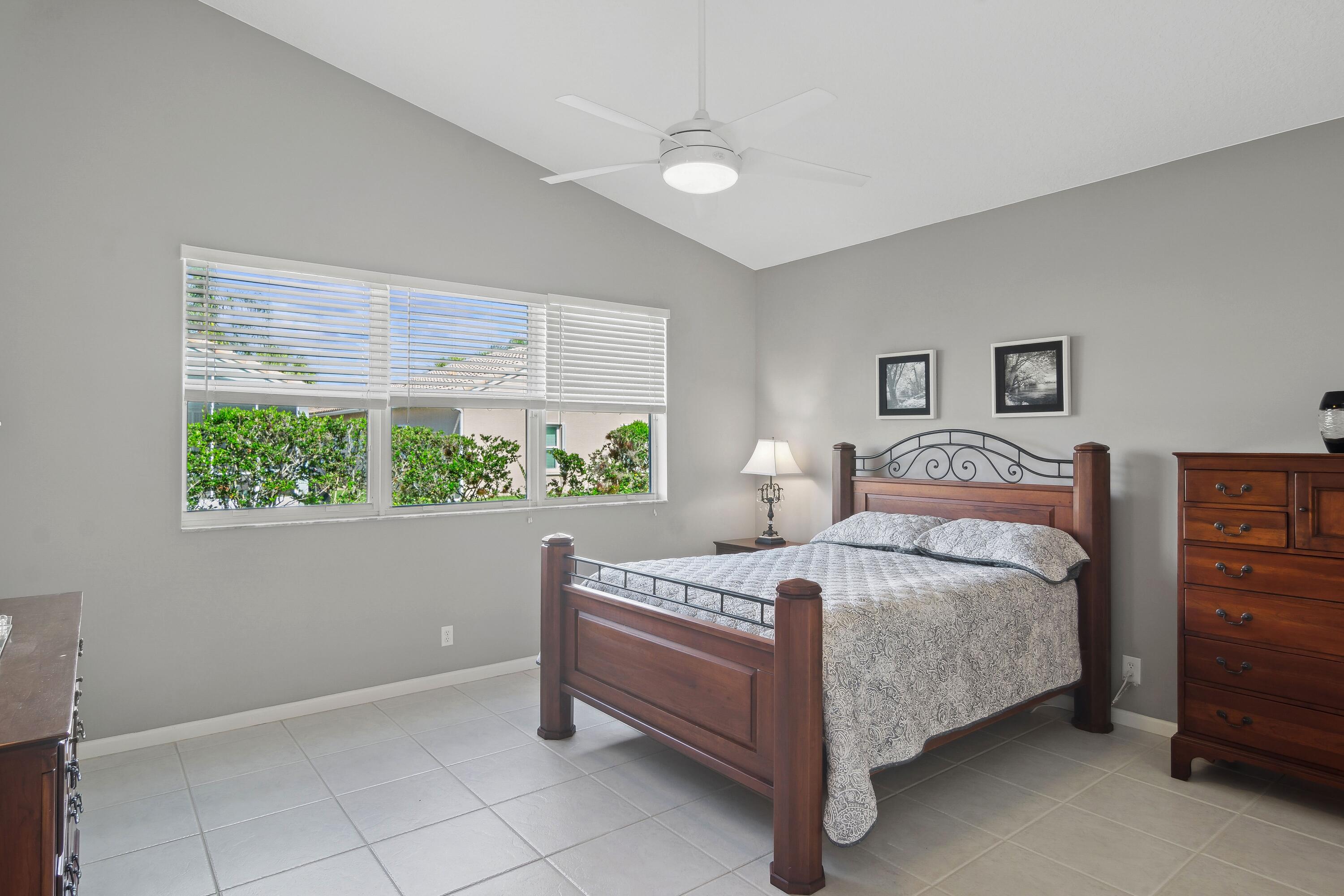 401 Springview Loop Port St. Lucie, FL 34986 - Photo 12 of 54 13_401NWSpringviewLoop_14_PrimaryBedroom