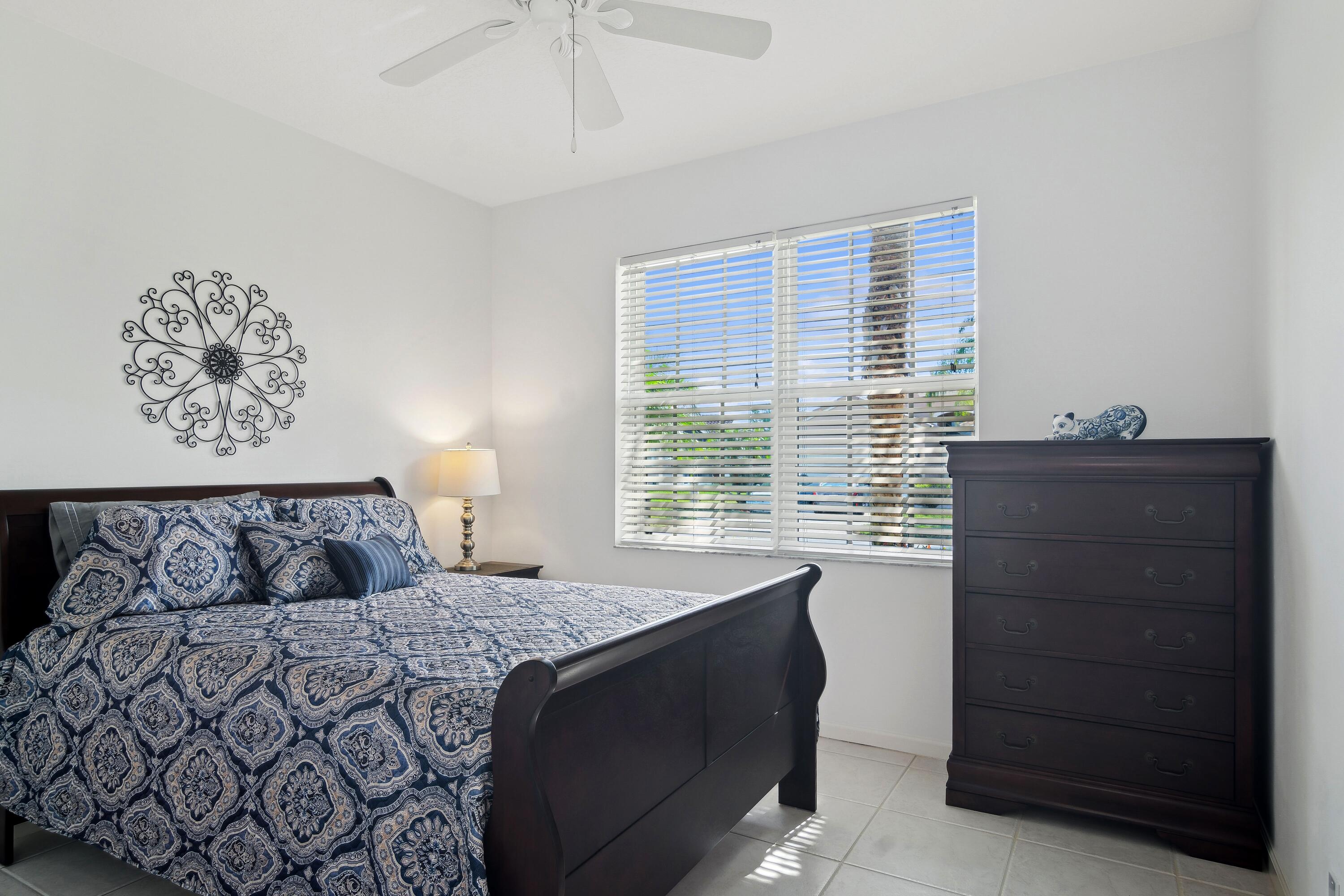 401 Springview Loop Port St. Lucie, FL 34986 - Photo 15 of 54 16_401NWSpringviewLoop_153_2ndBedroom_Hi