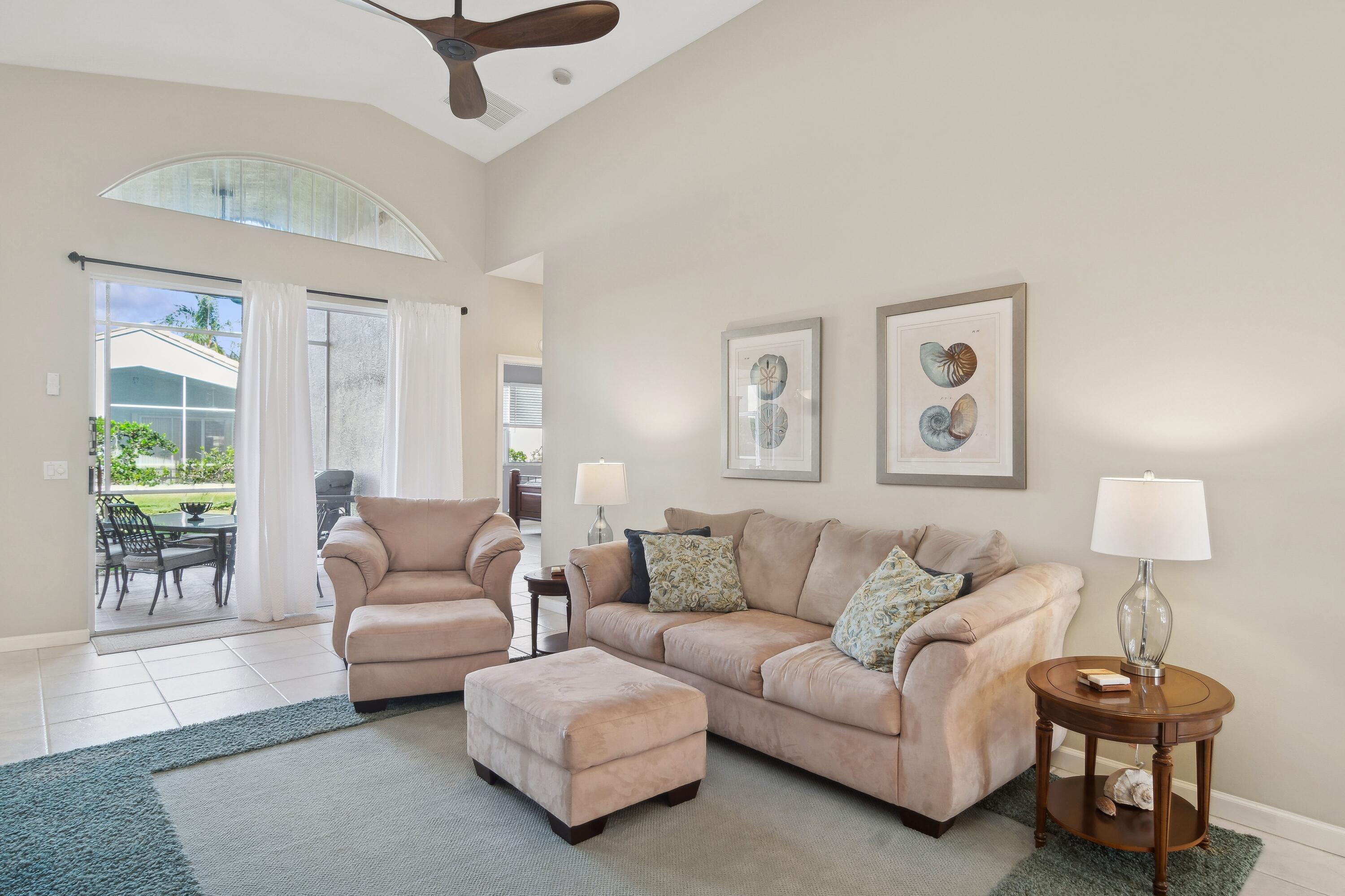 401 Springview Loop Port St. Lucie, FL 34986 - Photo 3 of 54 03_401NWSpringviewLoop_1_LivingRoom_HiRe