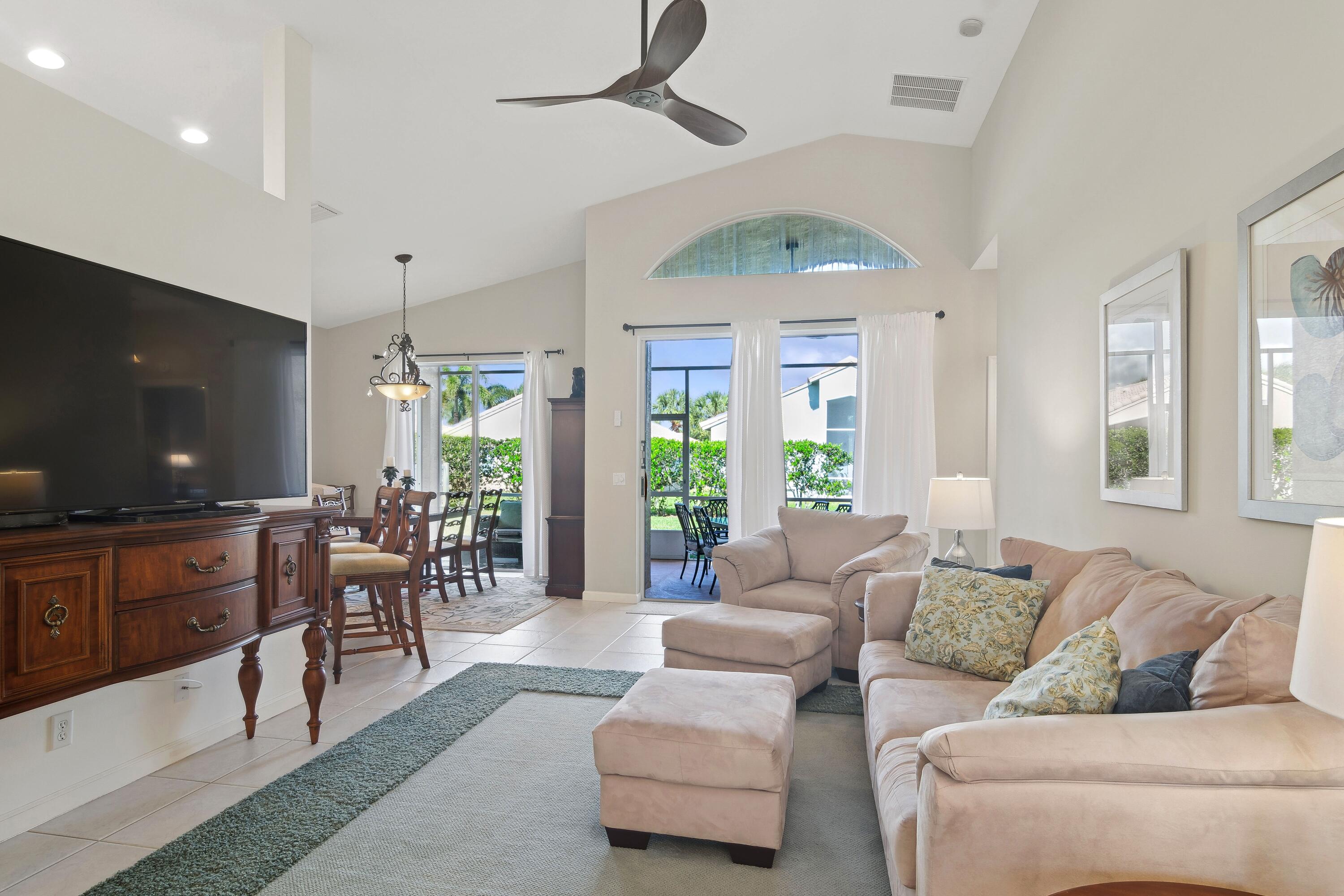 401 Springview Loop Port St. Lucie, FL 34986 - Photo 4 of 54 04_401NWSpringviewLoop_21_GreatRoom_HiRe