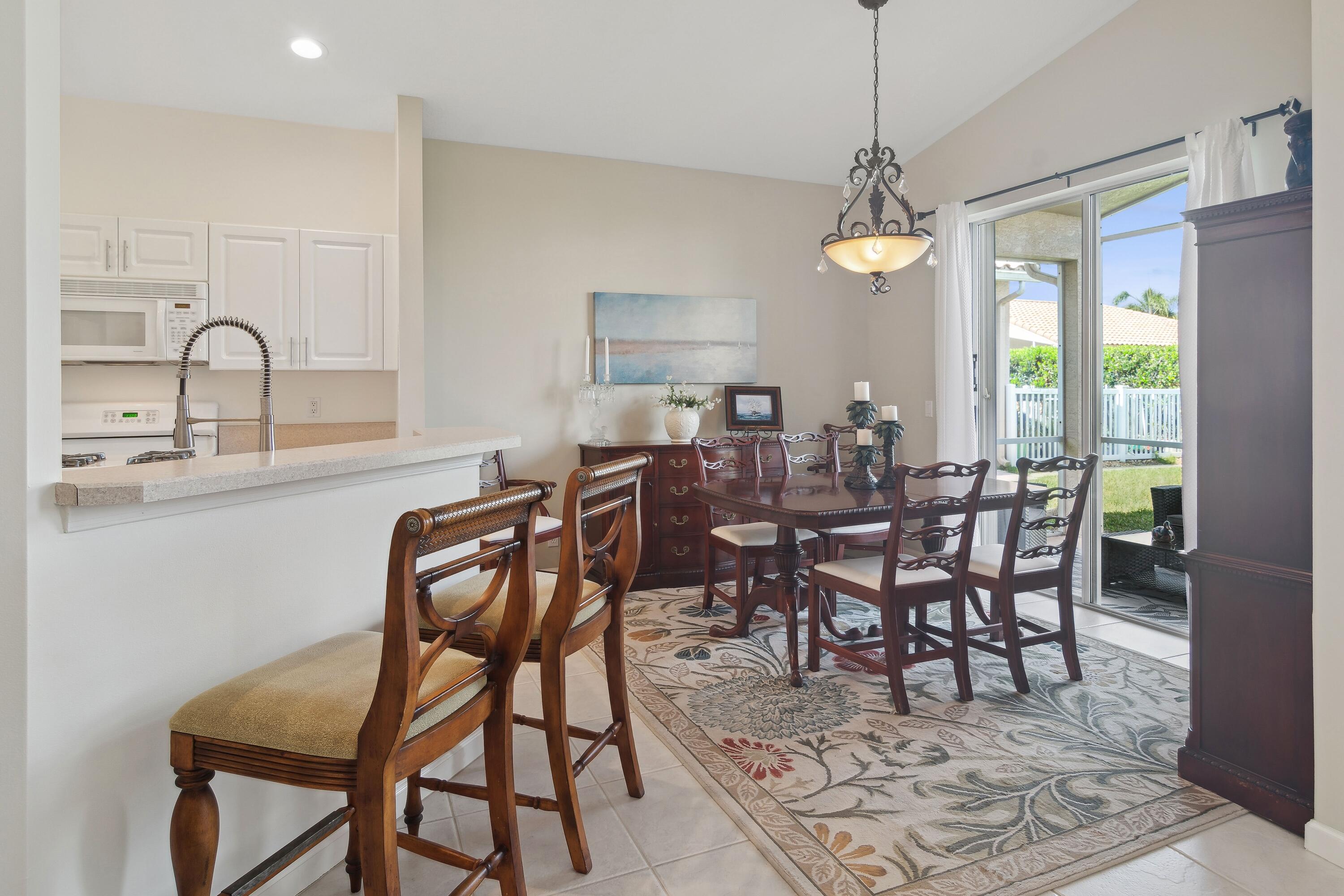 401 Springview Loop Port St. Lucie, FL 34986 - Photo 6 of 54 06_401NWSpringviewLoop_369_DiningArea_Hi