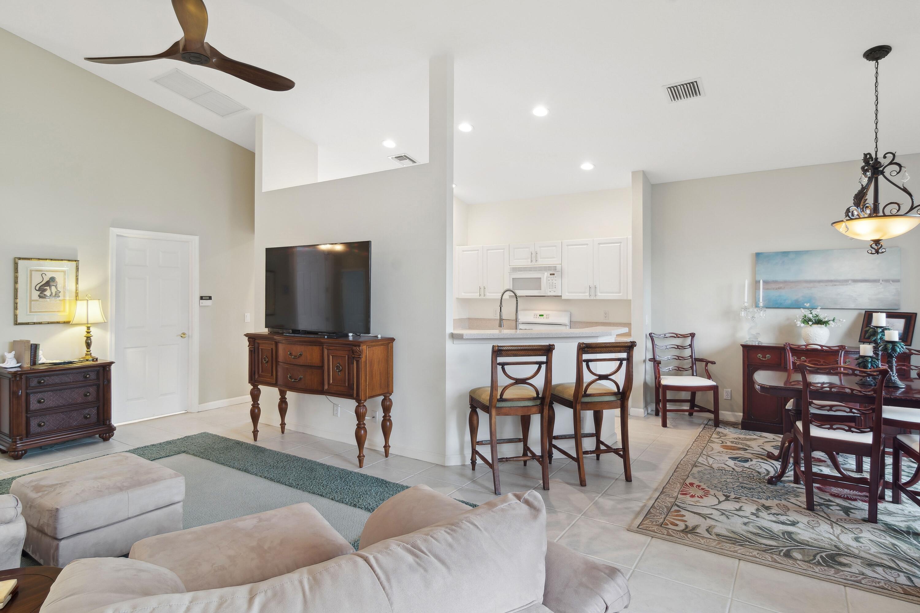 401 Springview Loop Port St. Lucie, FL 34986 - Photo 8 of 54 08_401NWSpringviewLoop_21004_Greatroom_H