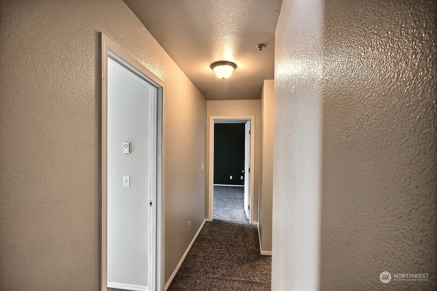 1826 Kennedy Place, Unit D7 DuPont, WA 98327 - Photo 11 of 19 a view of hallway with mirror