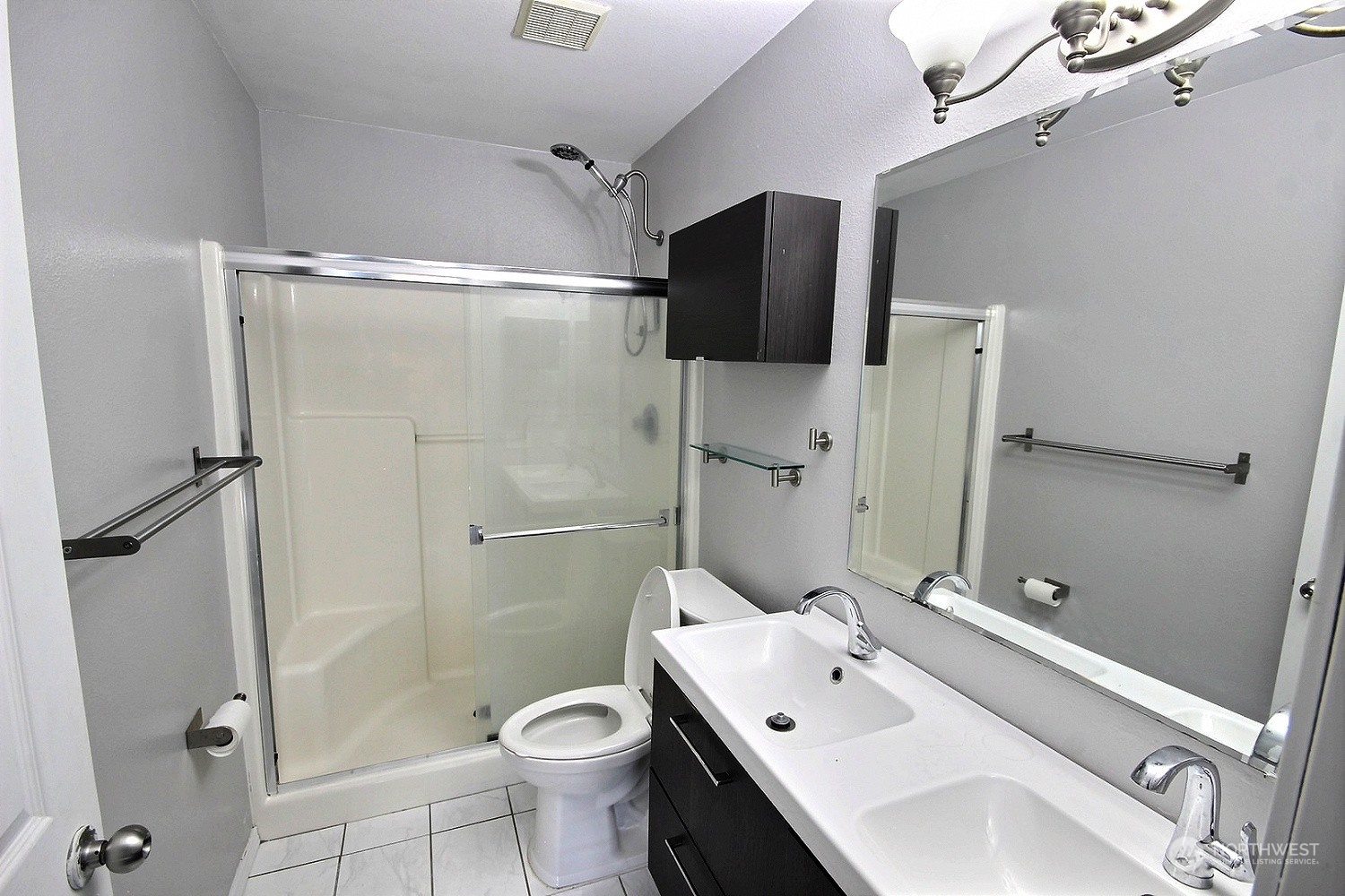 1826 Kennedy Place, Unit D7 DuPont, WA 98327 - Photo 12 of 19 a bathroom with a sink toilet and shower