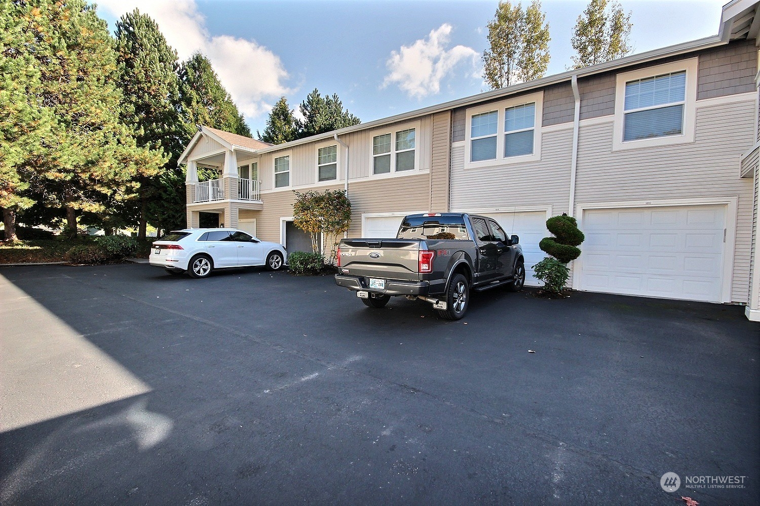 1826 Kennedy Place, Unit D7 DuPont, WA 98327 - Photo 19 of 19 a view of a car garage
