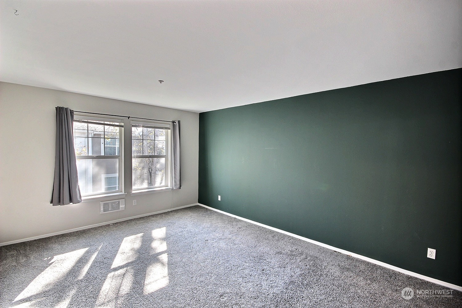 1826 Kennedy Place, Unit D7 DuPont, WA 98327 - Photo 9 of 19 an empty room with a window