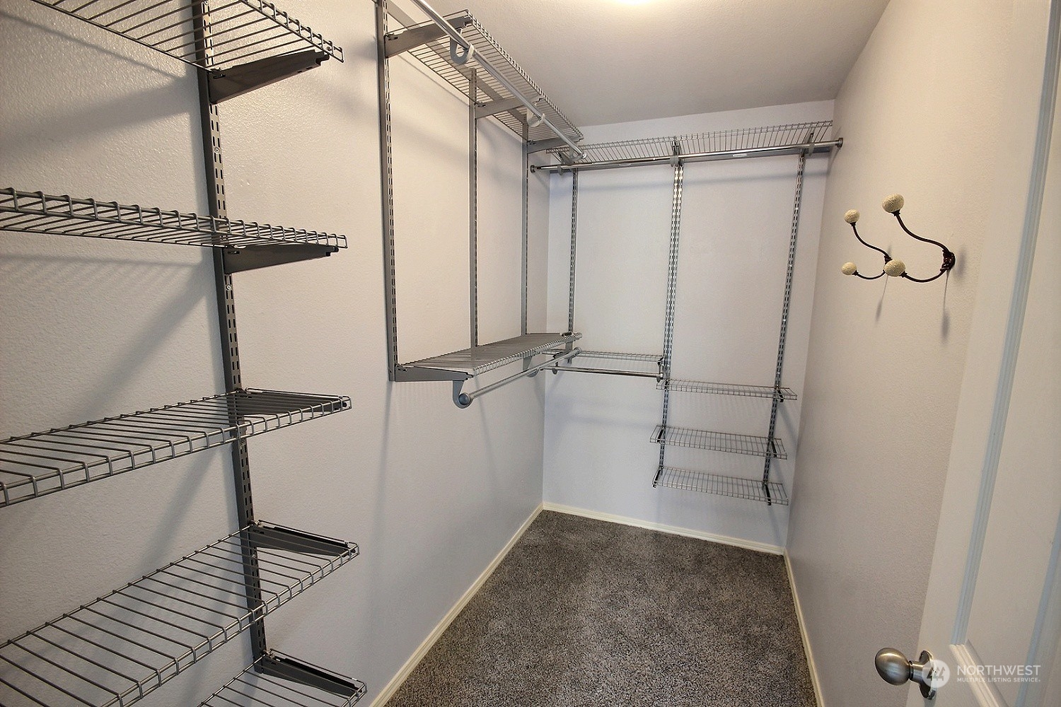 1826 Kennedy Place, Unit D7 DuPont, WA 98327 - Photo 10 of 19 a view of a walk in closet